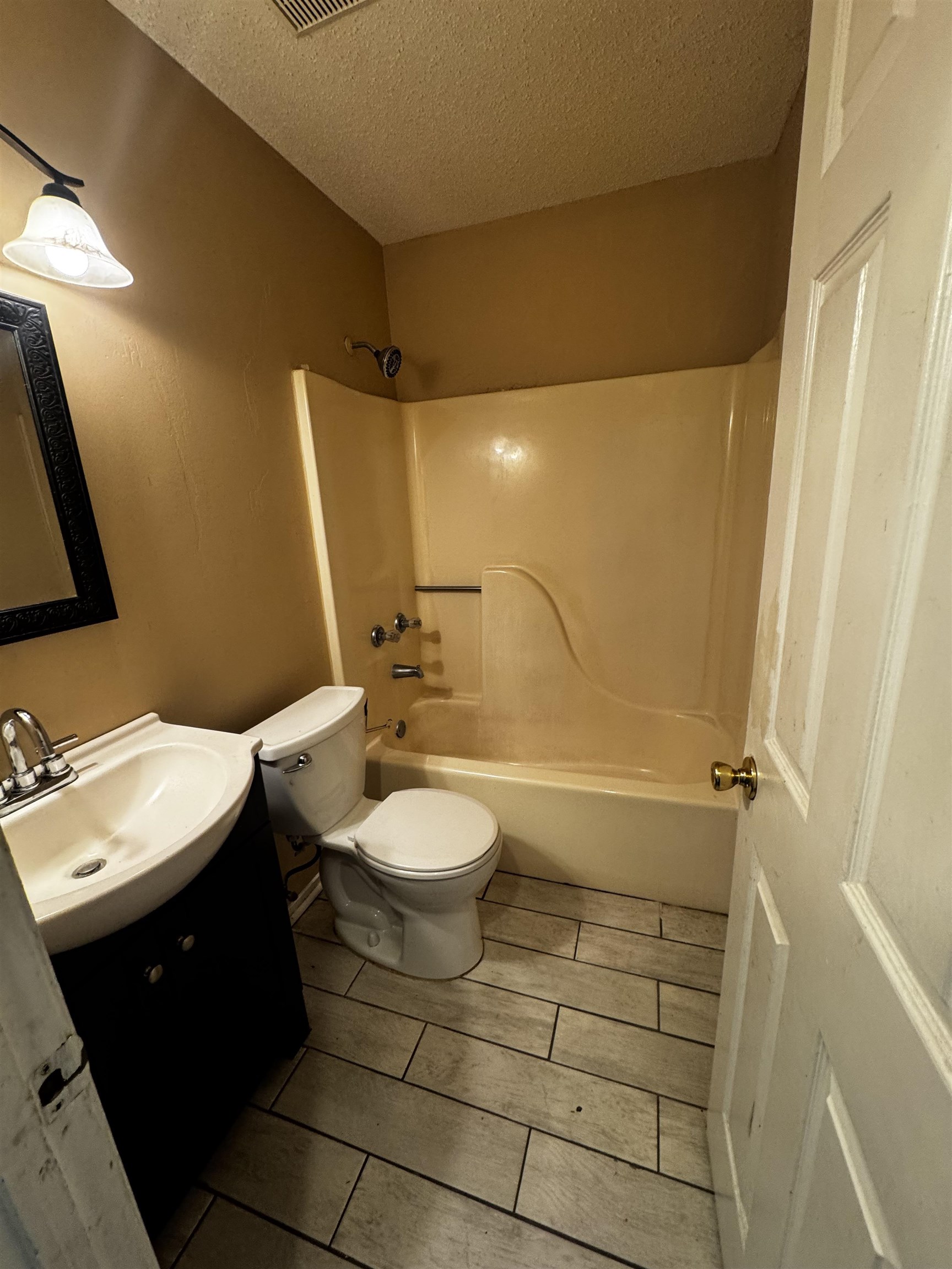 5840 Hickory Shadow Lane Memphis, TN 38141 - Photo 7 of 11 a bathroom with a double vanity sink toilet and shower