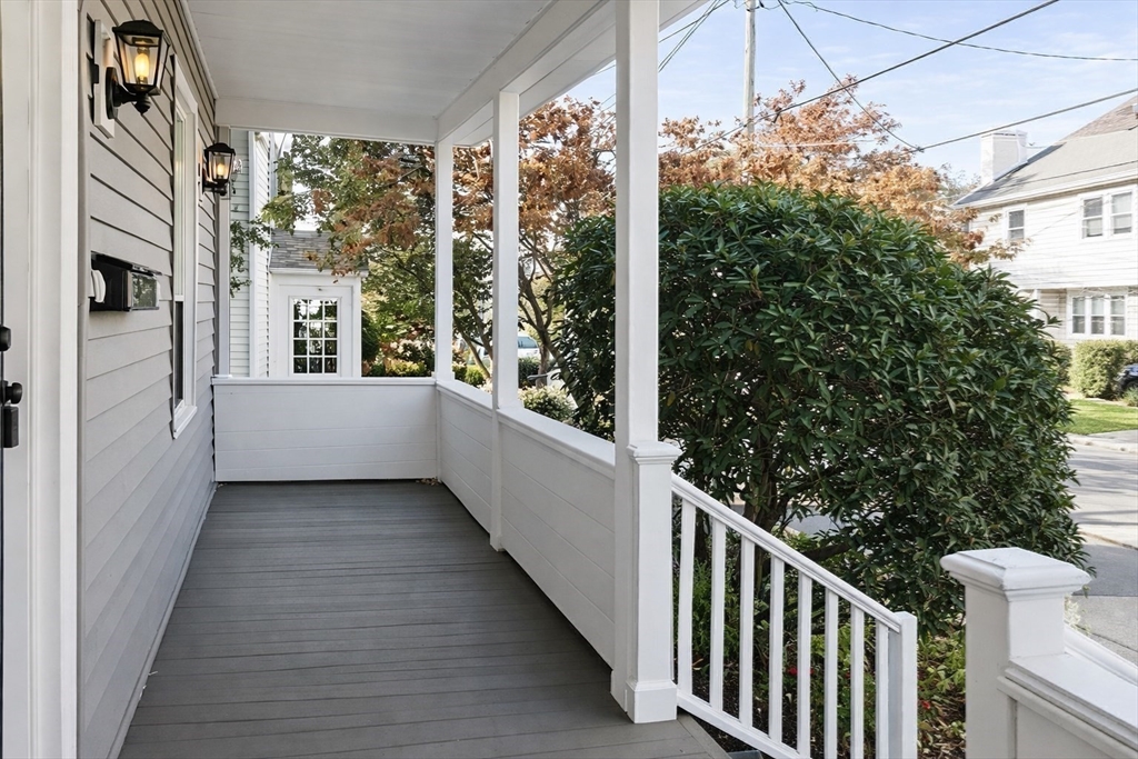 58 Bennett Street, Unit 1 Wakefield, MA 01880 - Photo 11 of 17 a view of a balcony with yard