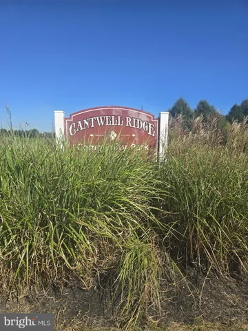 a sign that is sitting in front of a building