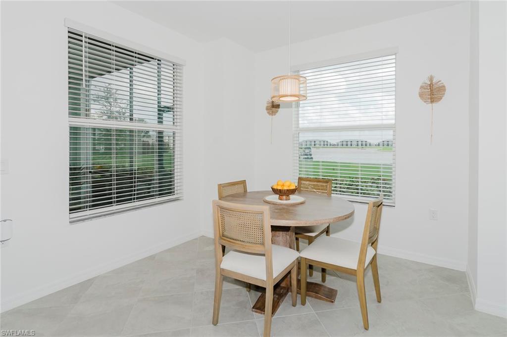 5445 Double Eagle Circle, Unit 3013 Ave Maria, FL 34142 - Photo 22 of 41 a view of a workspace with furniture and a window