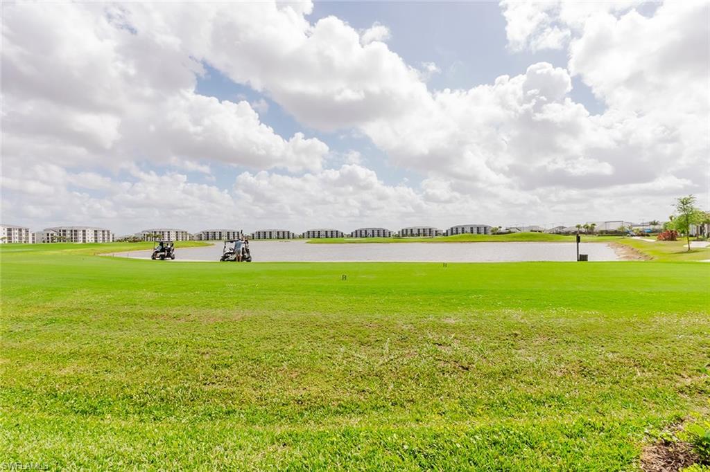 5445 Double Eagle Circle, Unit 3013 Ave Maria, FL 34142 - Photo 28 of 41 a view of an ocean and beach
