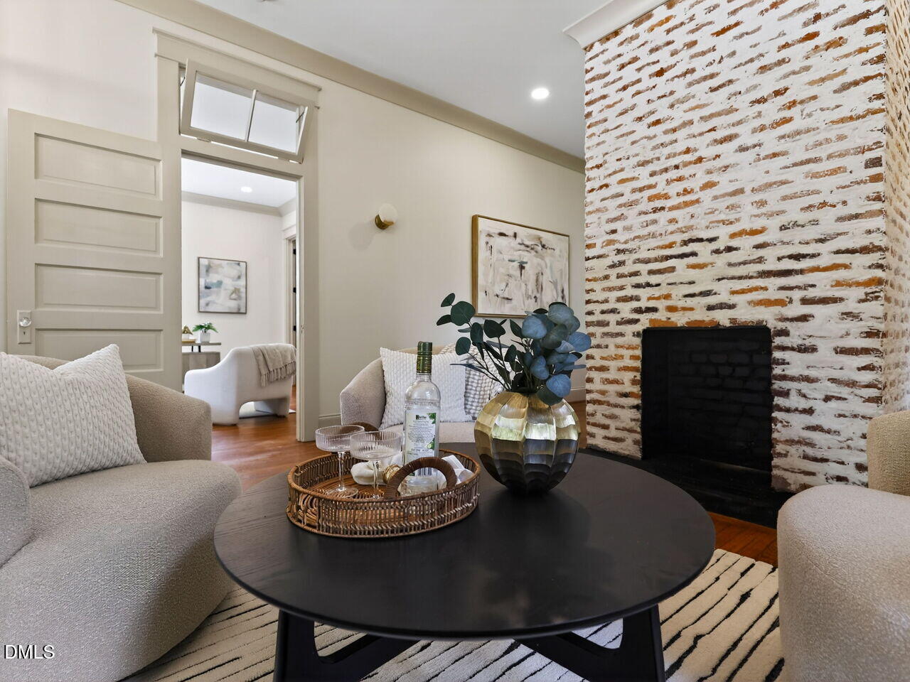 504 Tilden Street Raleigh, NC 27605 - Photo 10 of 58 a living room with furniture and wooden floor