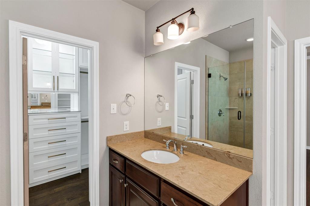 420 Prairie Run Aledo, TX 76008 - Photo 23 of 37 a bathroom with a granite countertop sink and a mirror
