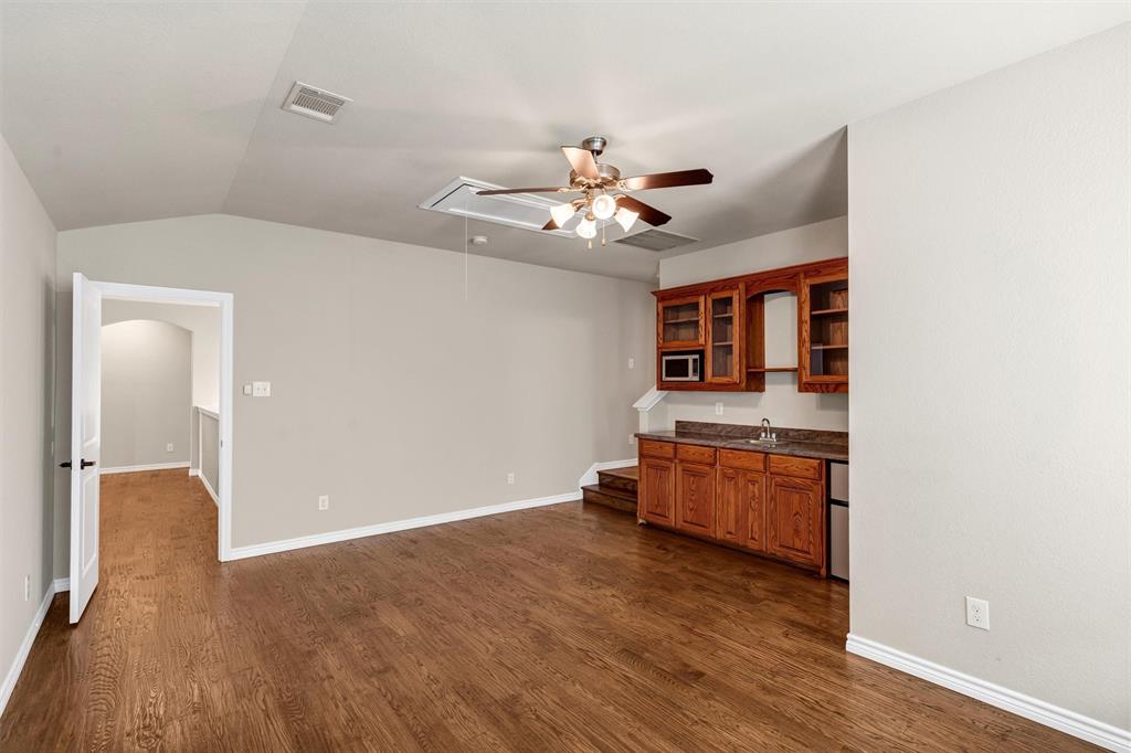 420 Prairie Run Aledo, TX 76008 - Photo 31 of 37 a view of a livingroom with a kitchen