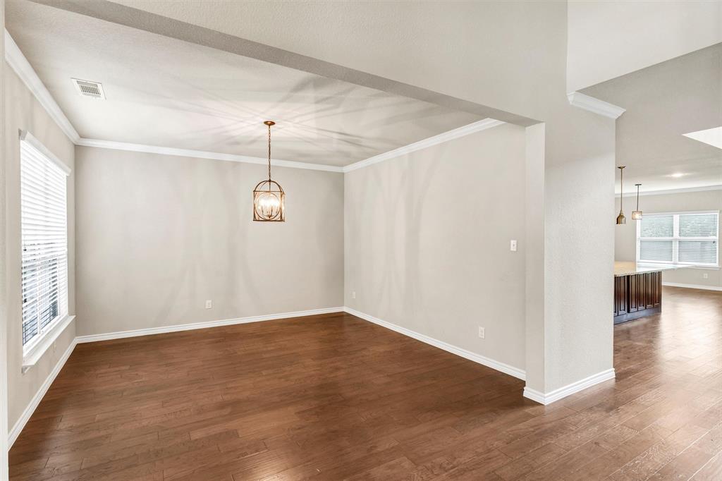 420 Prairie Run Aledo, TX 76008 - Photo 7 of 37 a view of a room with wooden floor and windows