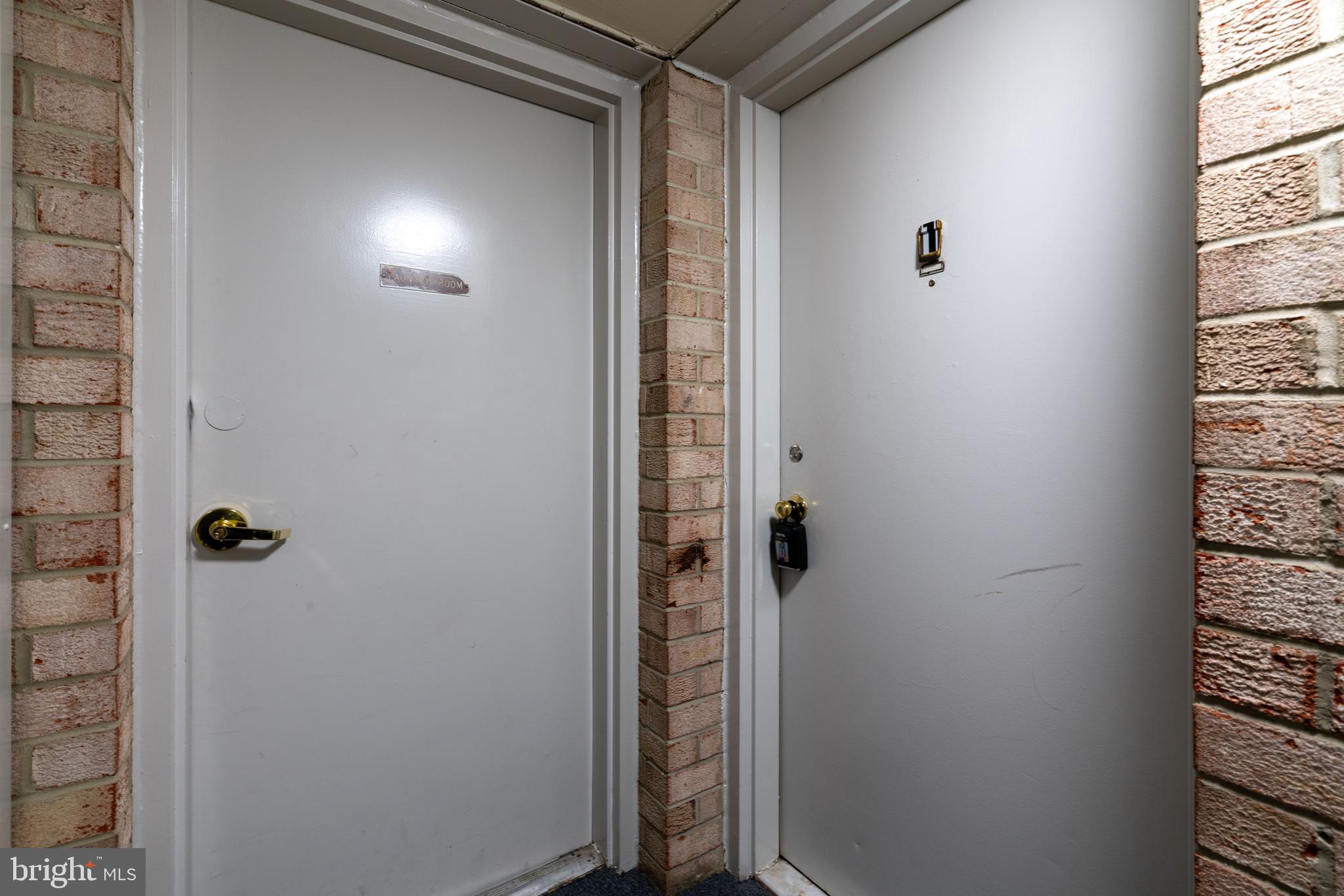 3720 Bel Pre Road, Unit 1 Silver Spring, MD 20906 - Photo 5 of 44 Laundry Room/Front Door