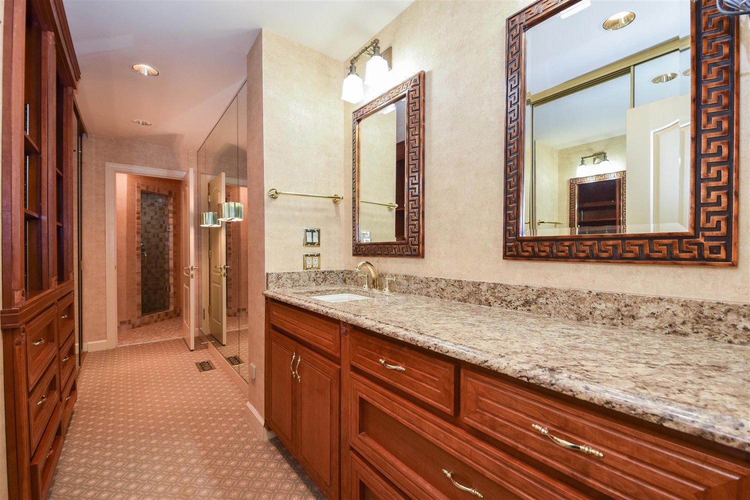 36 Cardinal Road Southwest Roanoke, VA 24014 - Photo 22 of 53 a bathroom with a granite countertop sink and a mirror