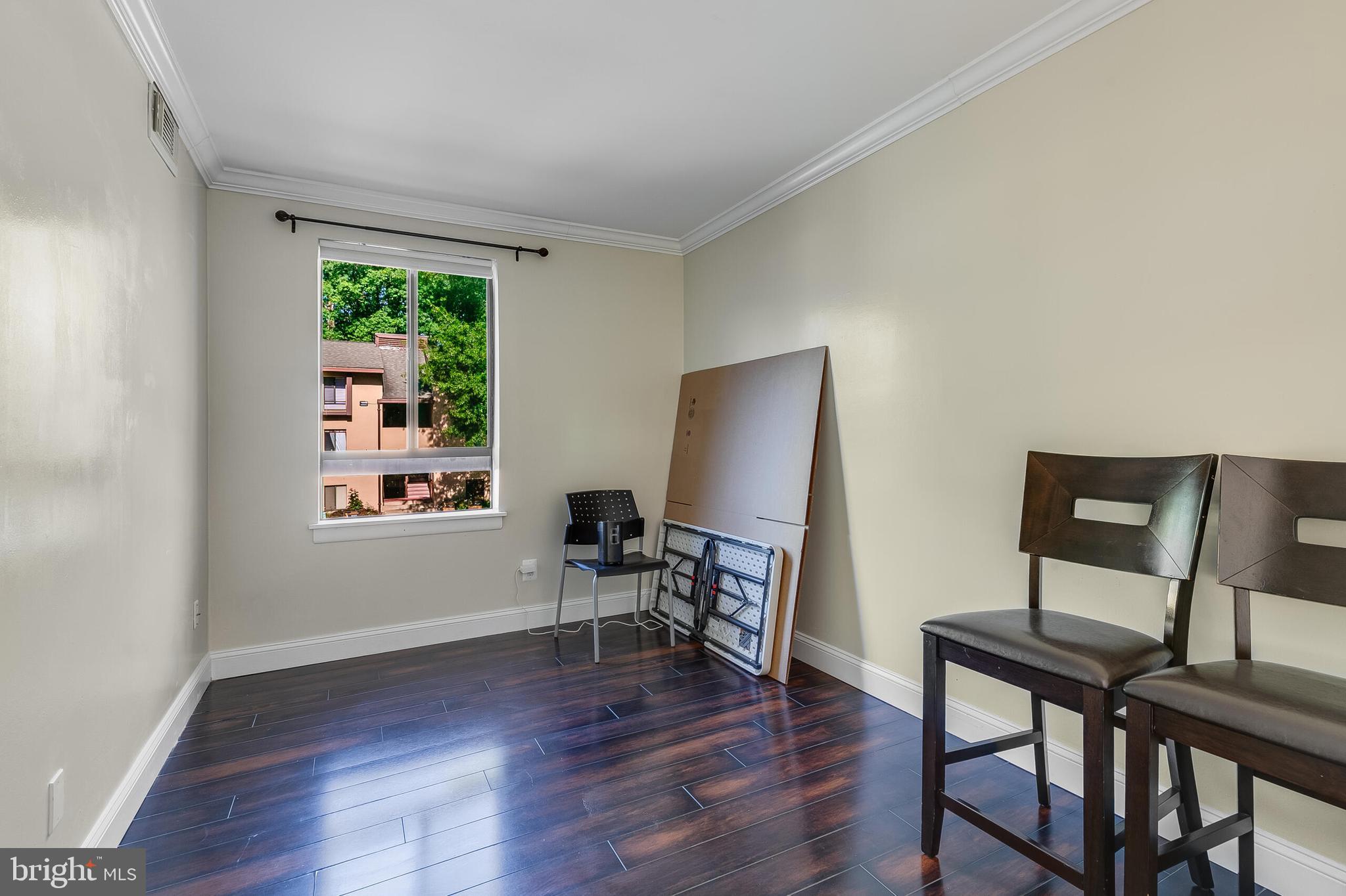 2255 Castle Rock Square, Unit 12C Reston, VA 20191 - Photo 15 of 29 a view of a workspace with furniture and a window