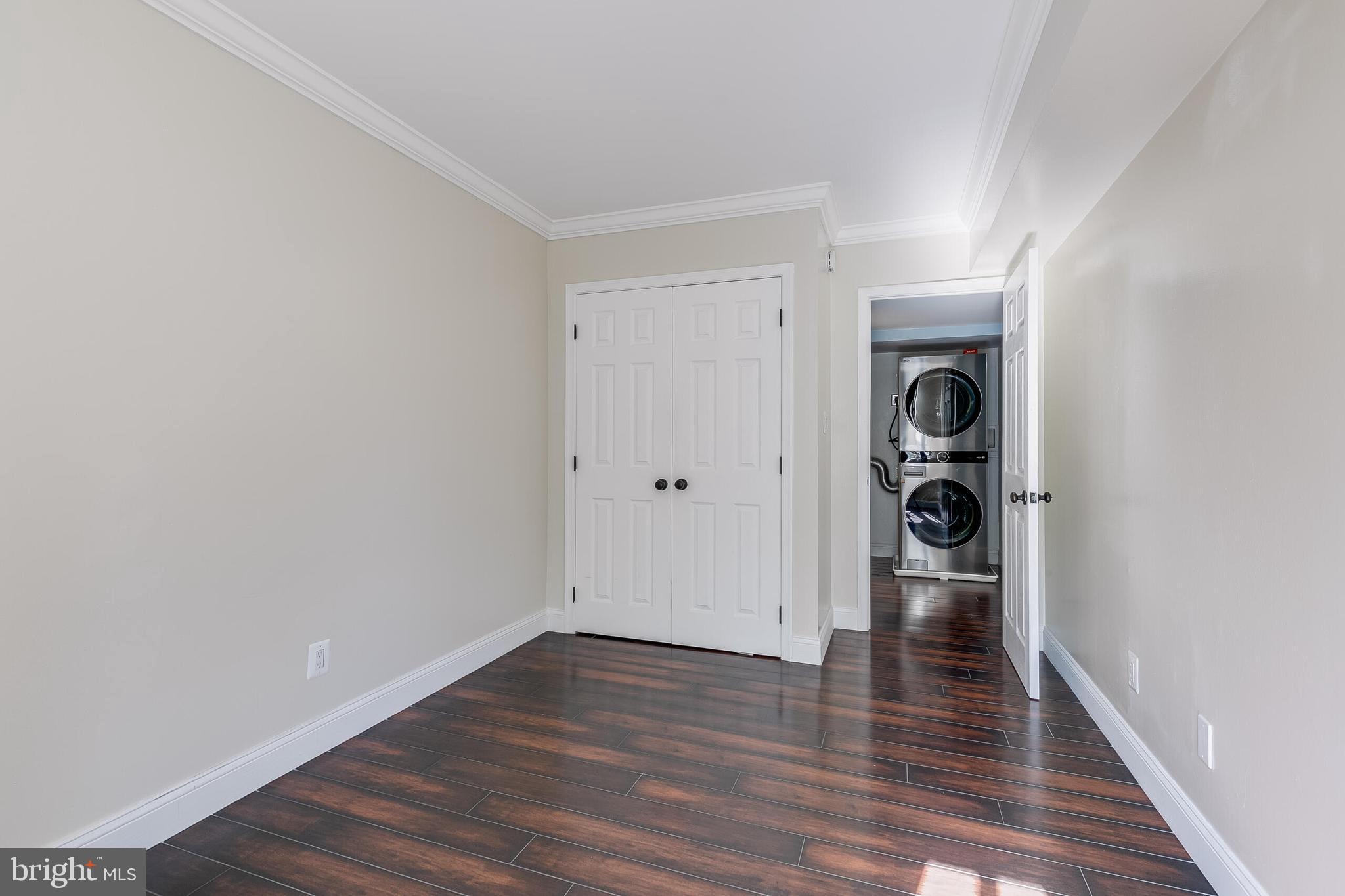 2255 Castle Rock Square, Unit 12C Reston, VA 20191 - Photo 17 of 29 wooden floor in an empty room