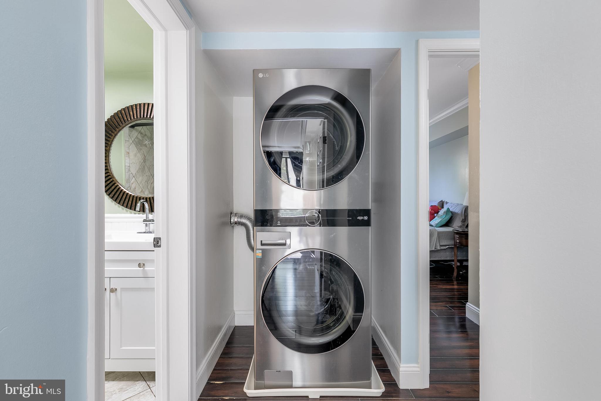 2255 Castle Rock Square, Unit 12C Reston, VA 20191 - Photo 18 of 29 a close up of a utility room with dryer and washer