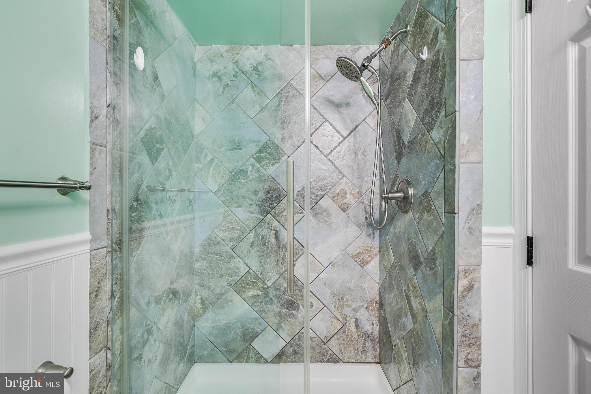 2255 Castle Rock Square, Unit 12C Reston, VA 20191 - Photo 24 of 29 a bathroom with a shower