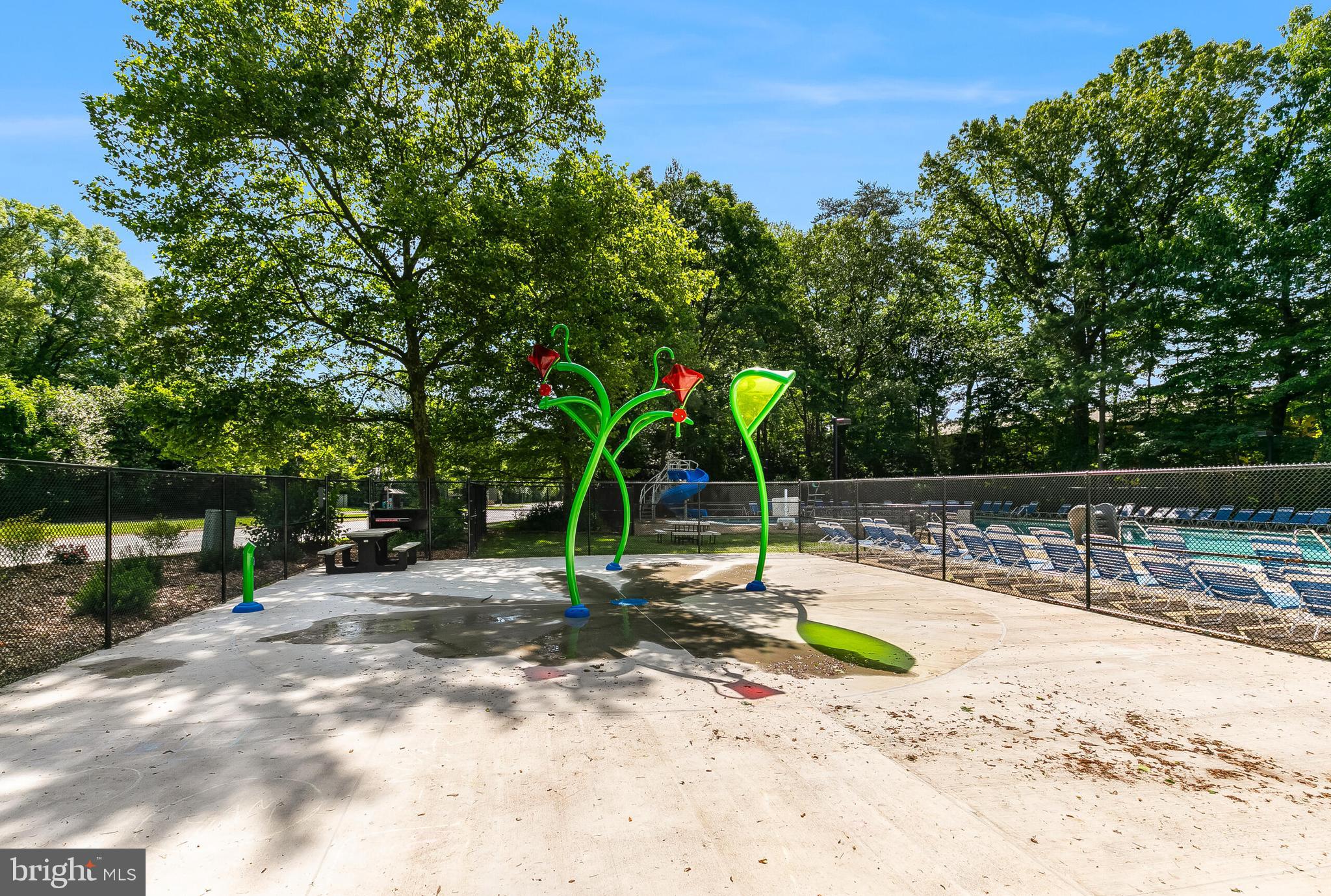2255 Castle Rock Square, Unit 12C Reston, VA 20191 - Photo 27 of 29 a view of a park with swings