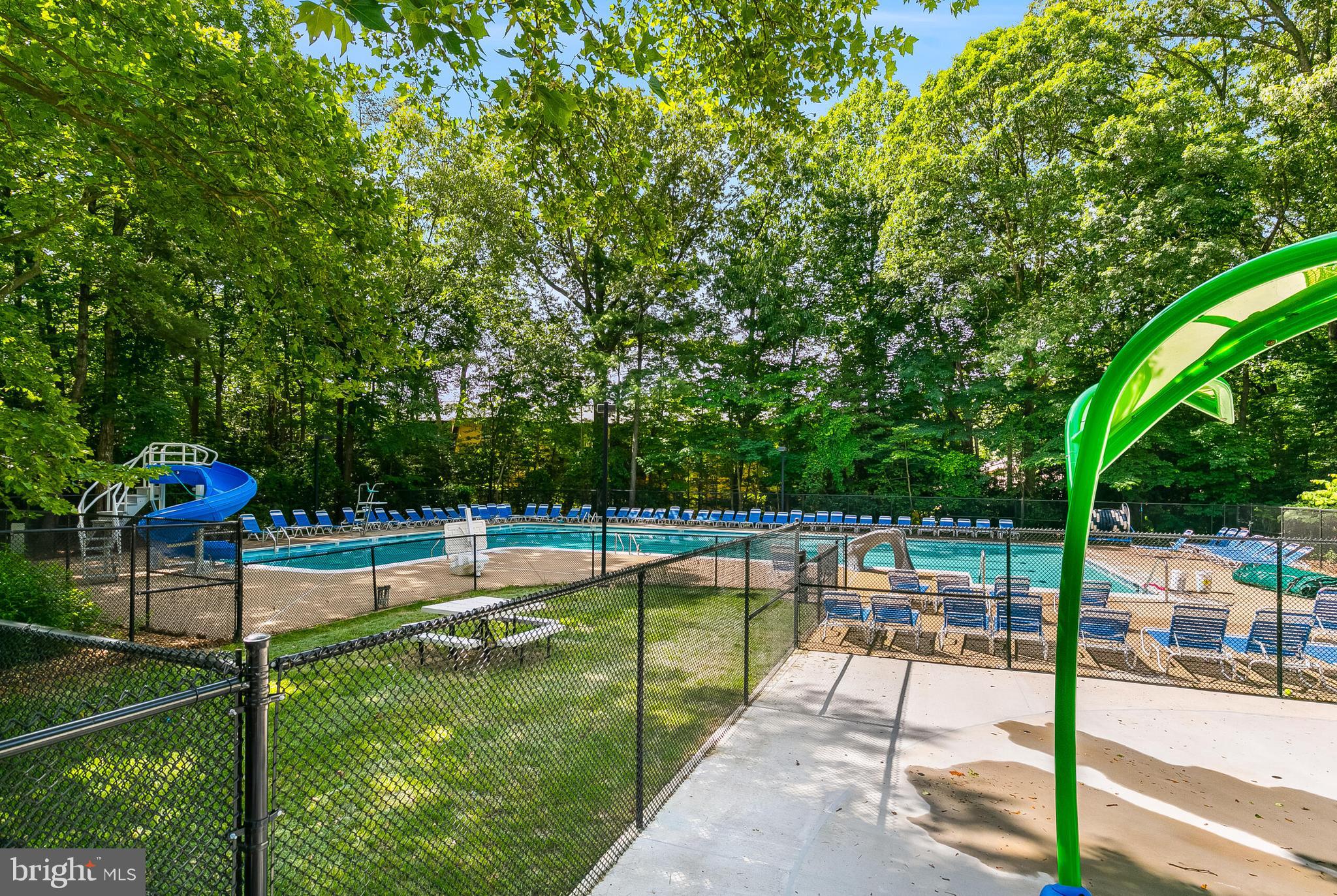 2255 Castle Rock Square, Unit 12C Reston, VA 20191 - Photo 28 of 29 a view of a swimming pool with a patio