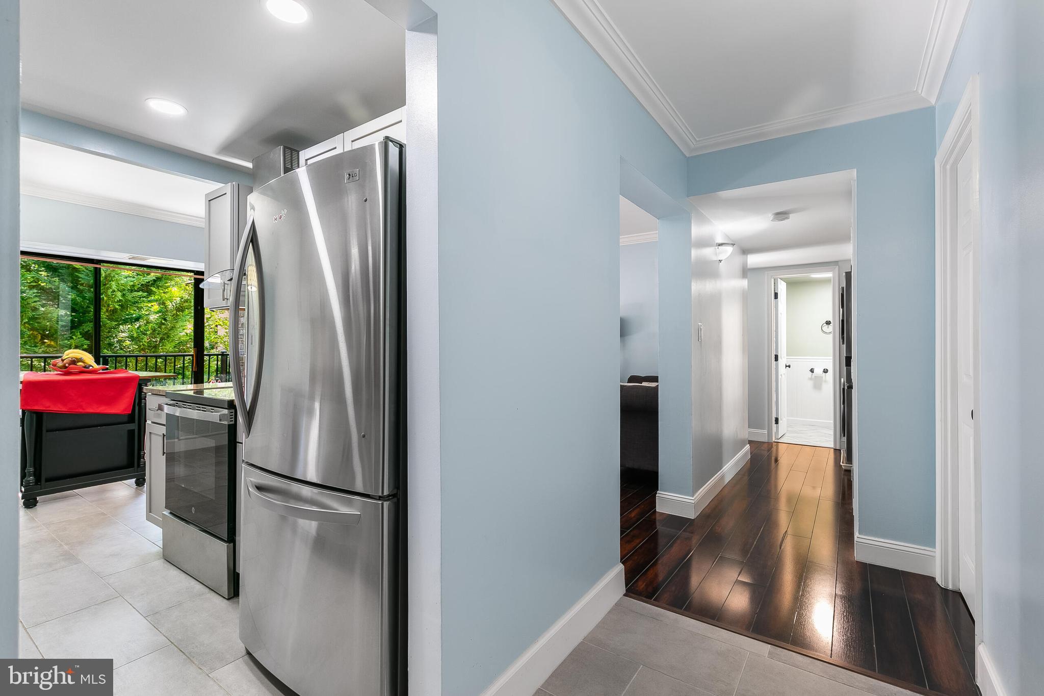 2255 Castle Rock Square, Unit 12C Reston, VA 20191 - Photo 3 of 29 a kitchen with stainless steel appliances a refrigerator and a stove