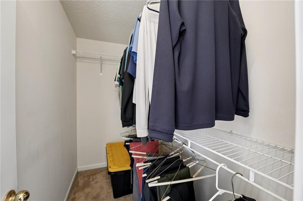 111 Bainbridge Court Dallas, GA 30132 - Photo 17 of 37 a room with a window and a walk in closet