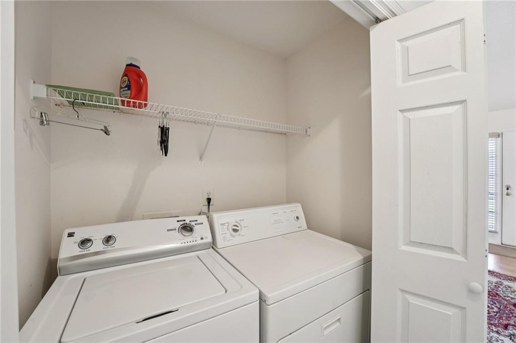 111 Bainbridge Court Dallas, GA 30132 - Photo 23 of 37 a utility room with dryer and washer