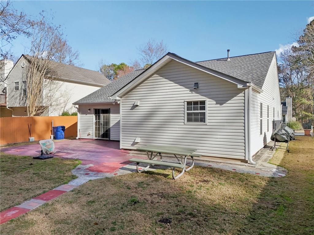 111 Bainbridge Court Dallas, GA 30132 - Photo 24 of 37 a view of a house with a yard