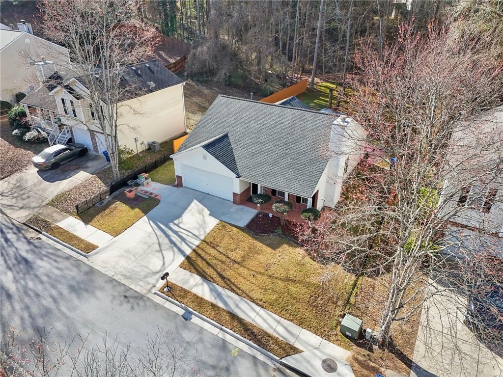 111 Bainbridge Court Dallas, GA 30132 - Photo 31 of 37 swimming pool with some trees and wooden fence
