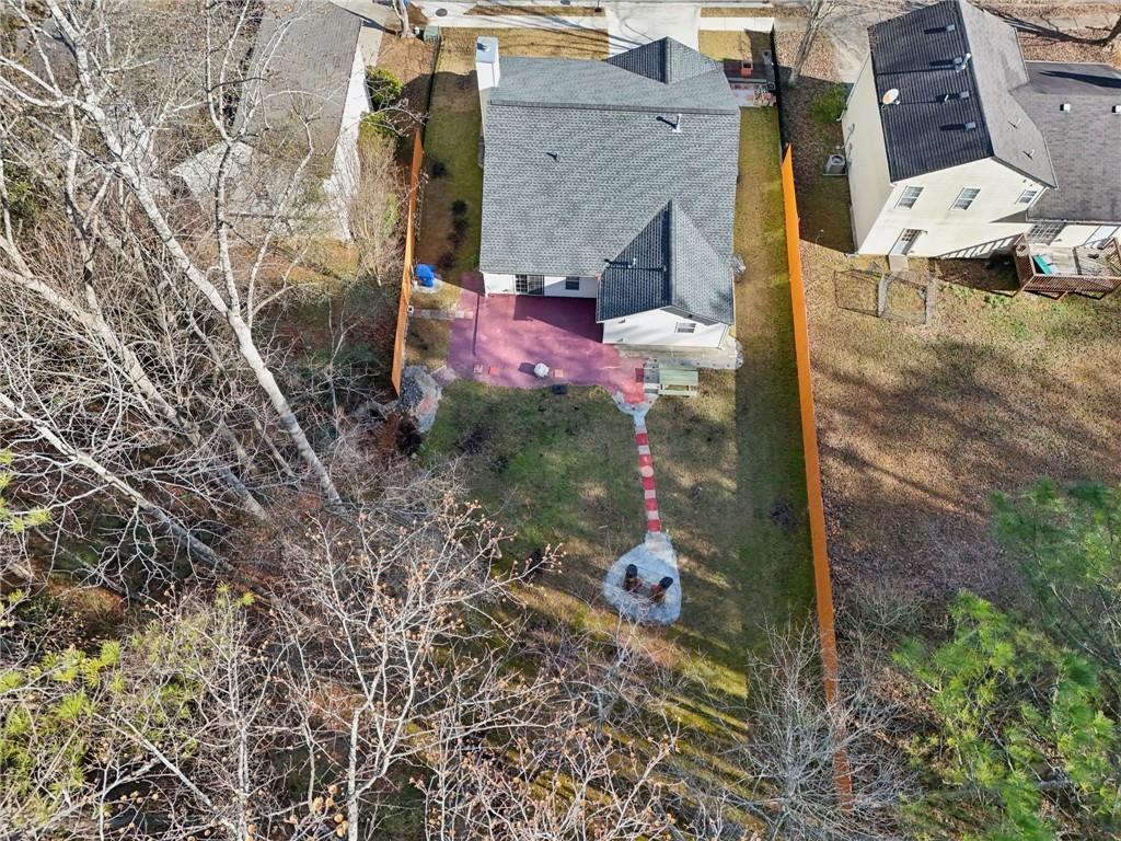 111 Bainbridge Court Dallas, GA 30132 - Photo 33 of 37 an aerial view of a house with a yard