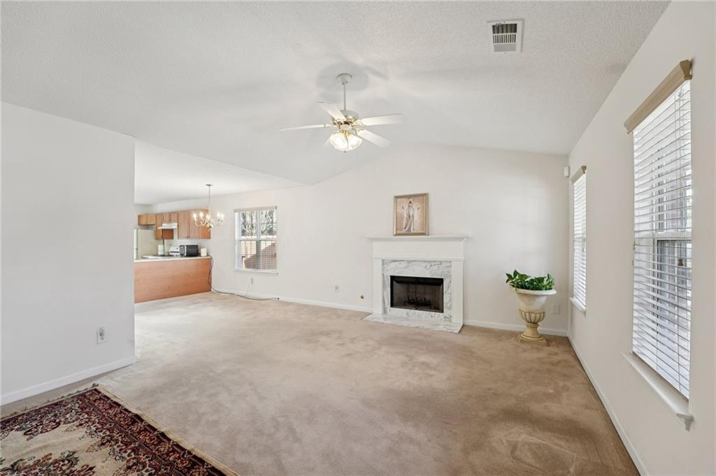 111 Bainbridge Court Dallas, GA 30132 - Photo 6 of 37 a view of an empty room with a window