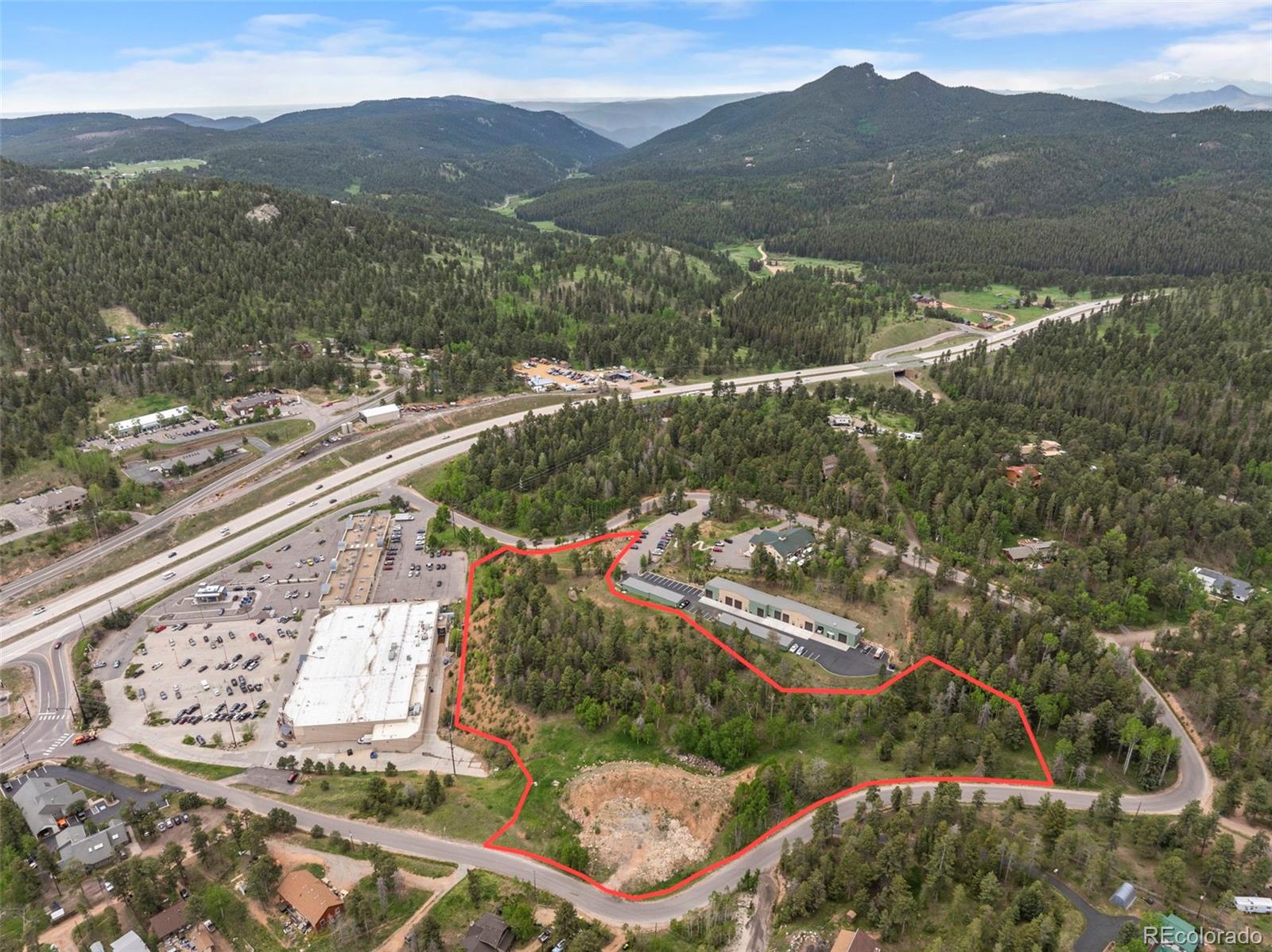 11040 Kitty Drive Conifer, CO 80433 - Photo 11 of 14 a view of a city from a lake