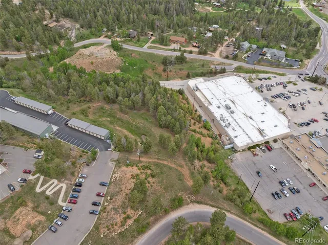 a view of swimming pool with a yard