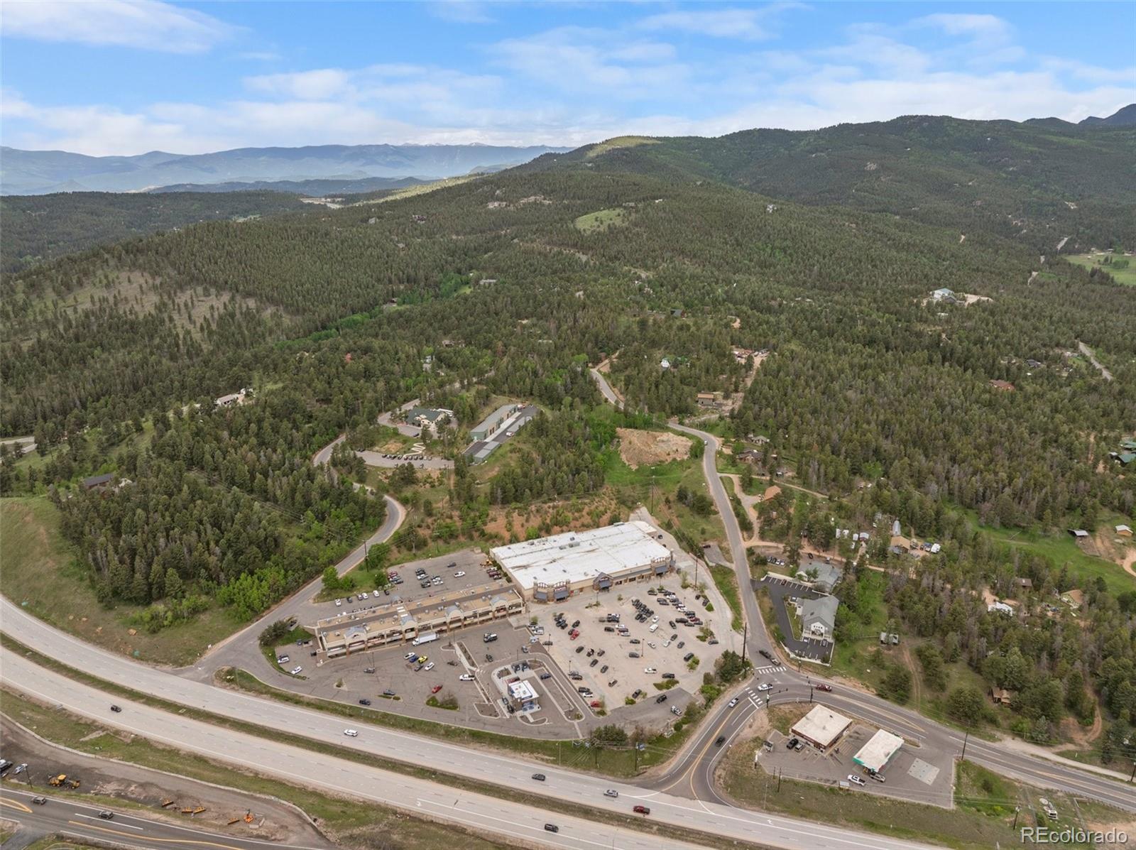 11040 Kitty Drive Conifer, CO 80433 - Photo 8 of 14 a view of a mountain from a balcony