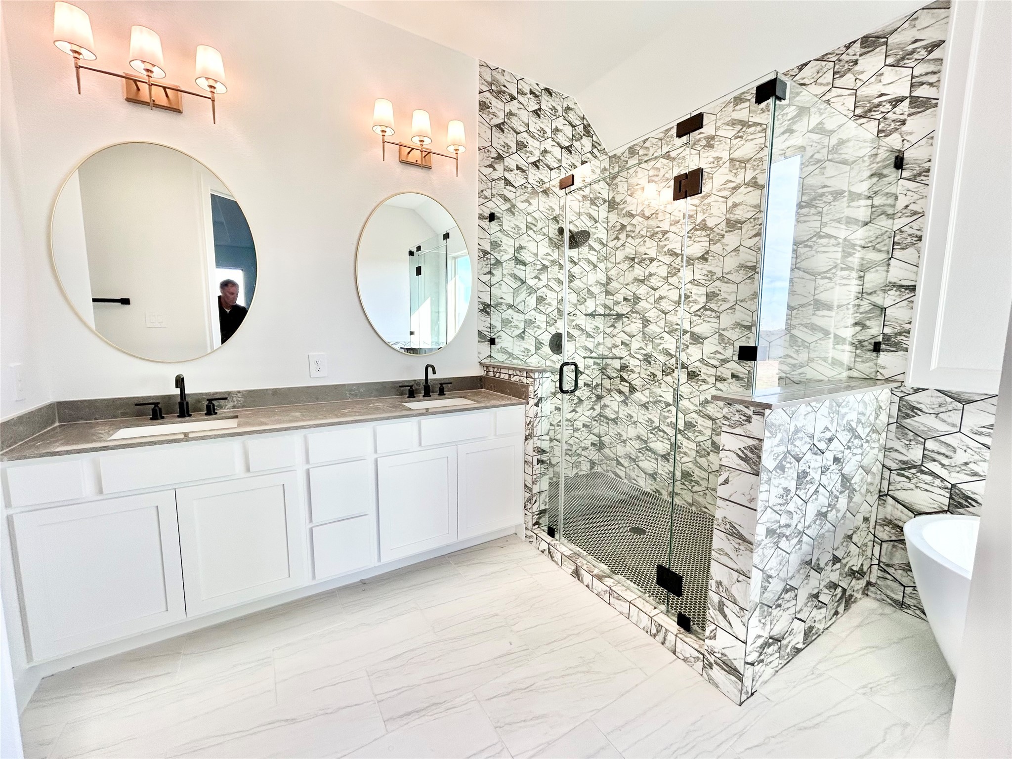 15722 North Tower Circle Santa Fe, TX 77517 - Photo 14 of 30 a bathroom with a double vanity sink mirror and shower