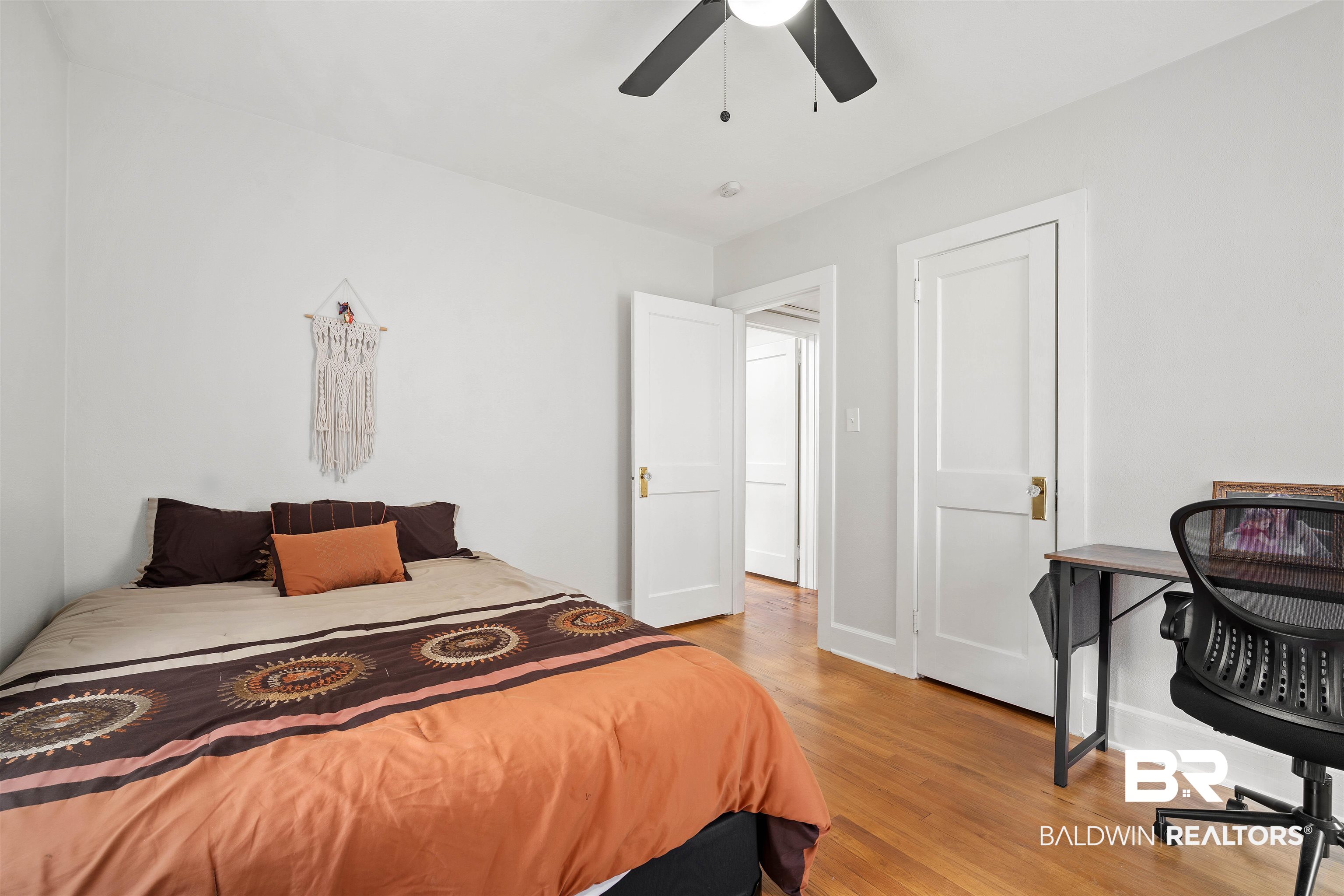 103 Emogene Place Mobile, AL 36606 - Photo 23 of 32 Bedroom featuring light wood finished floors, ceiling fan, and an office area