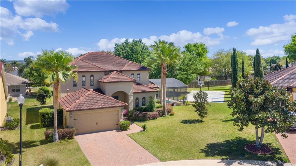 353 Crestrun Loop Leesburg, FL 34748 - Photo 1 of 1 a view of a house with a garden and yard