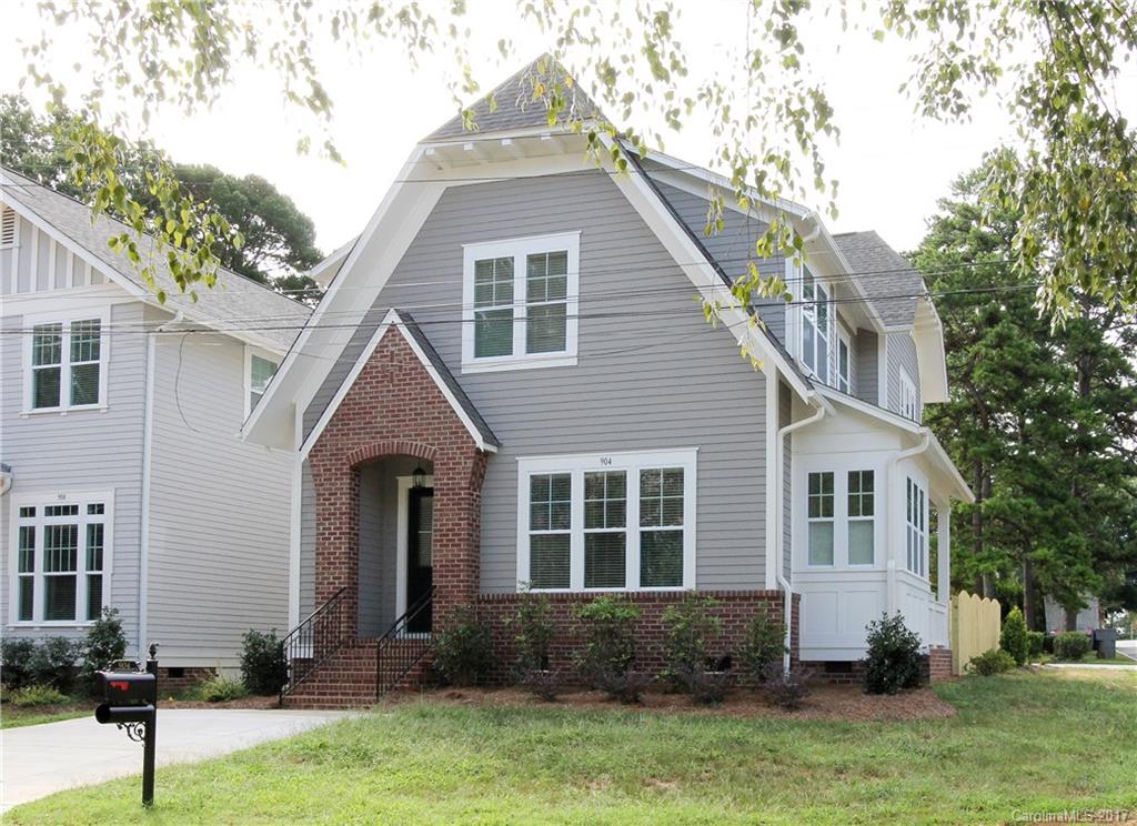 904 Millbrook Road, Unit 7A Charlotte, NC 28211 - Photo 2 of 22 a front view of a house with a yard