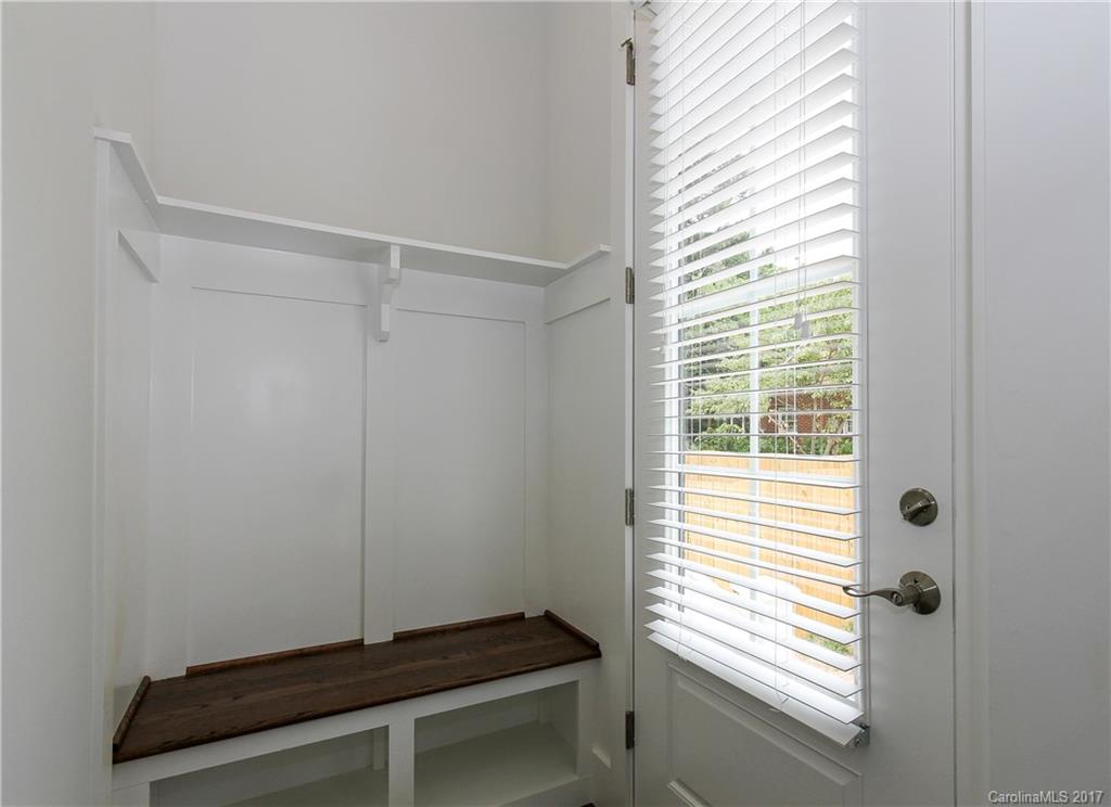 904 Millbrook Road, Unit 7A Charlotte, NC 28211 - Photo 16 of 22 a room with a window and a ceiling fan