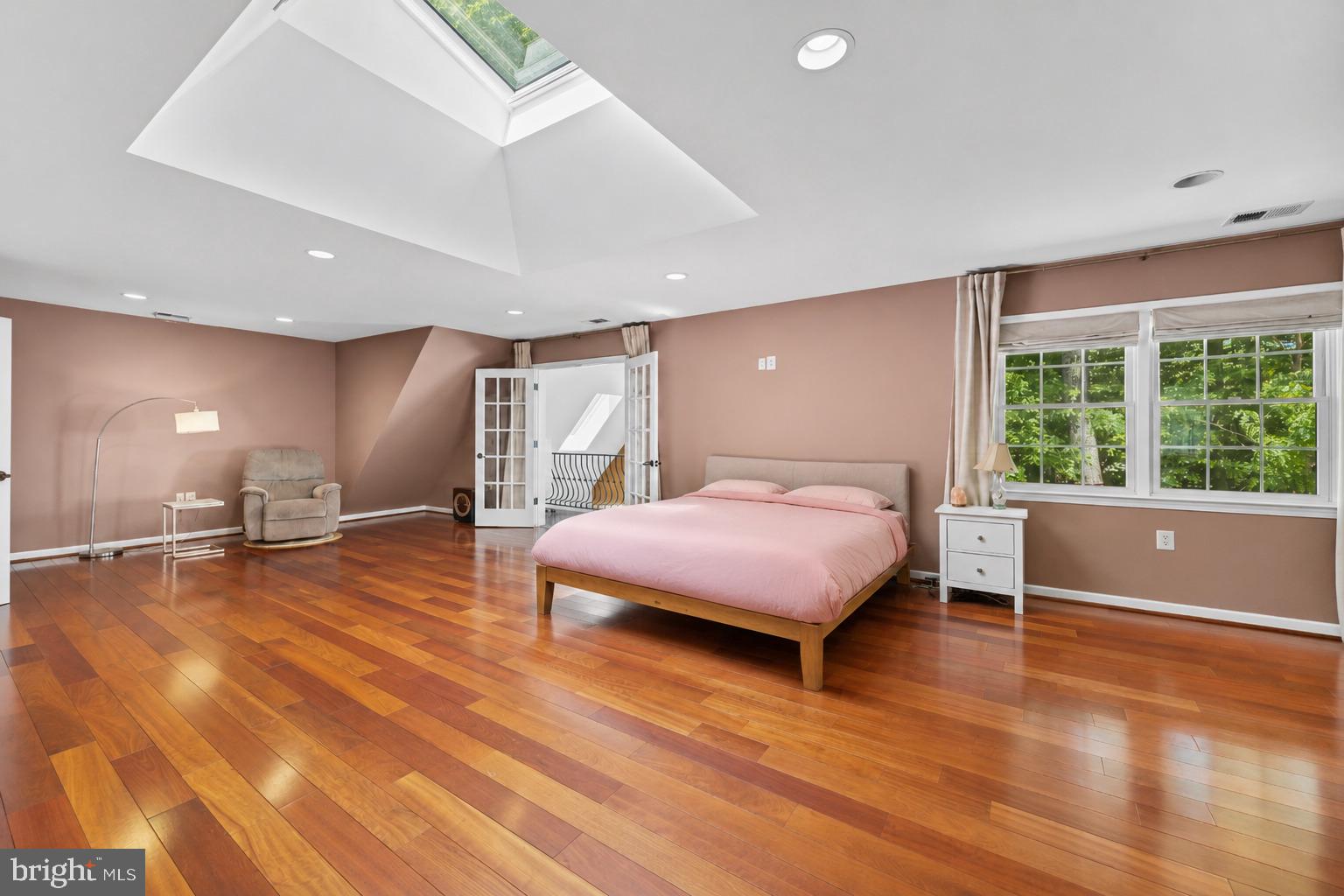 11019 Ring Road Reston, VA 20190 - Photo 29 of 78 a spacious bedroom with a large bed and a large window