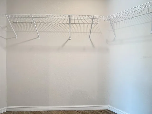 a view of small space with racks on the wall