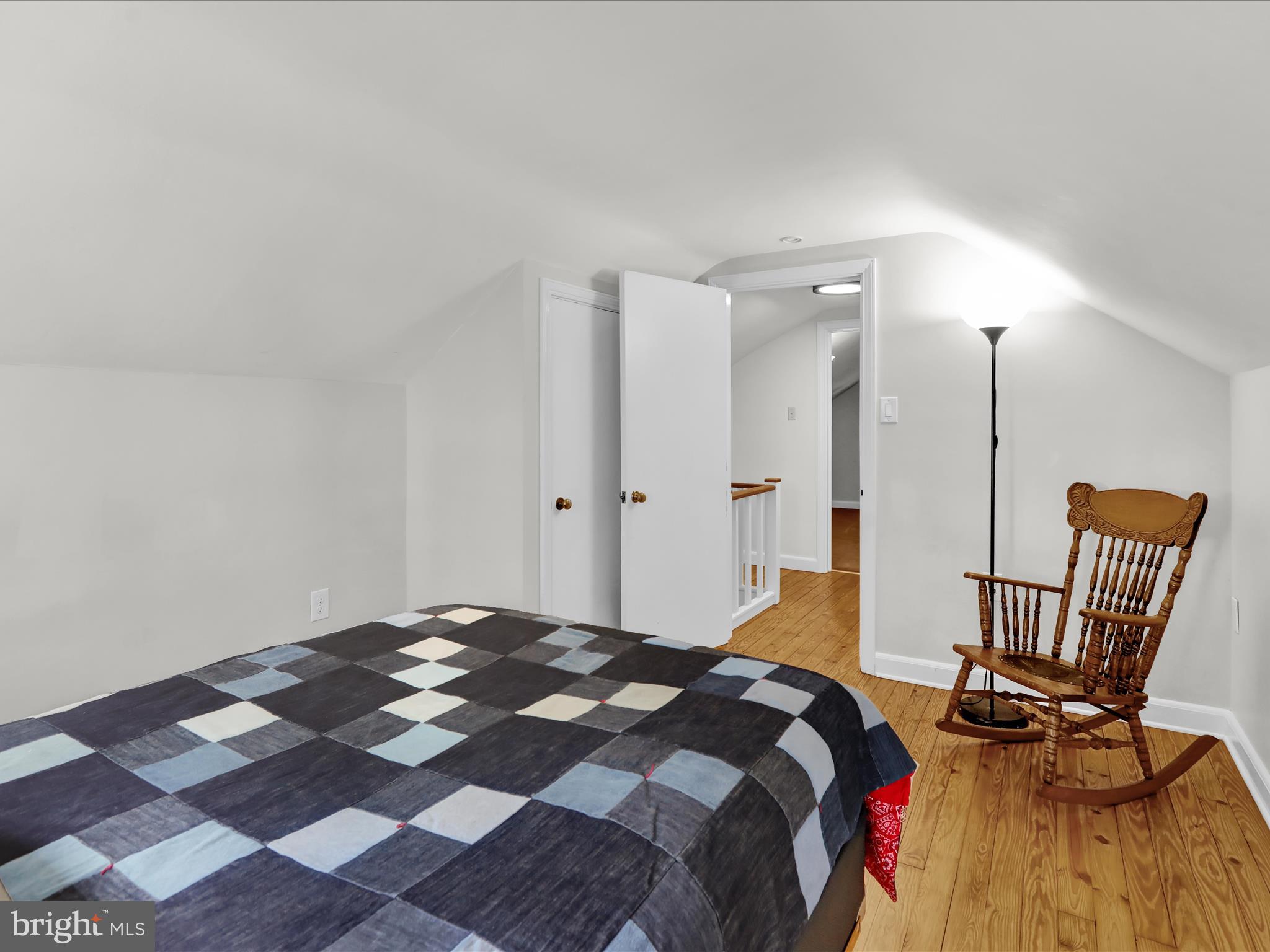 117 West Oregon Road Lititz, PA 17543 - Photo 13 of 34 a bedroom with a bed a chair and painting on the wall