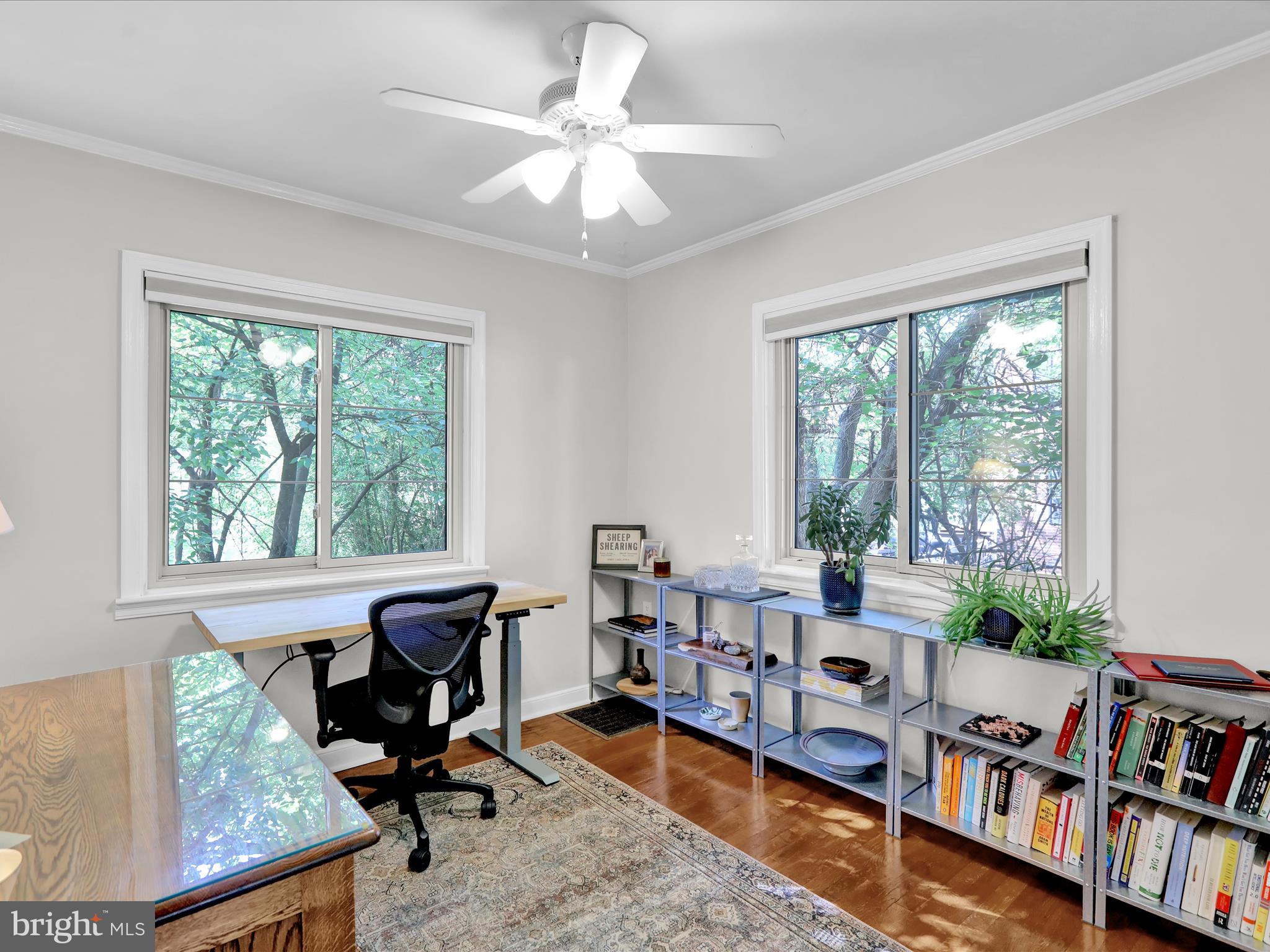 117 West Oregon Road Lititz, PA 17543 - Photo 14 of 34 a living room with furniture a bookshelf and a window