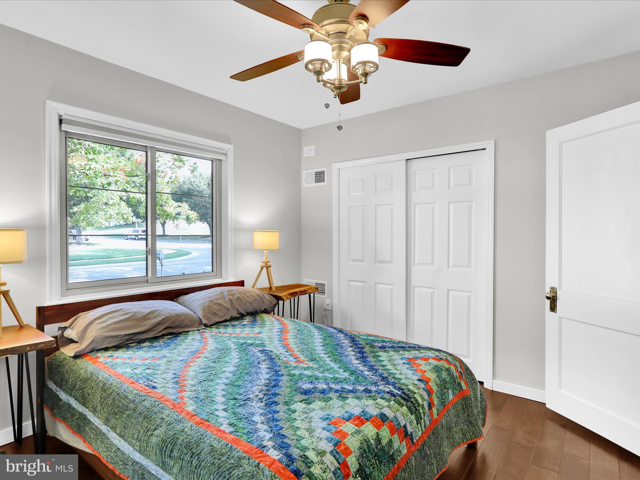 117 West Oregon Road Lititz, PA 17543 - Photo 17 of 34 a bedroom with a bed and a chandelier