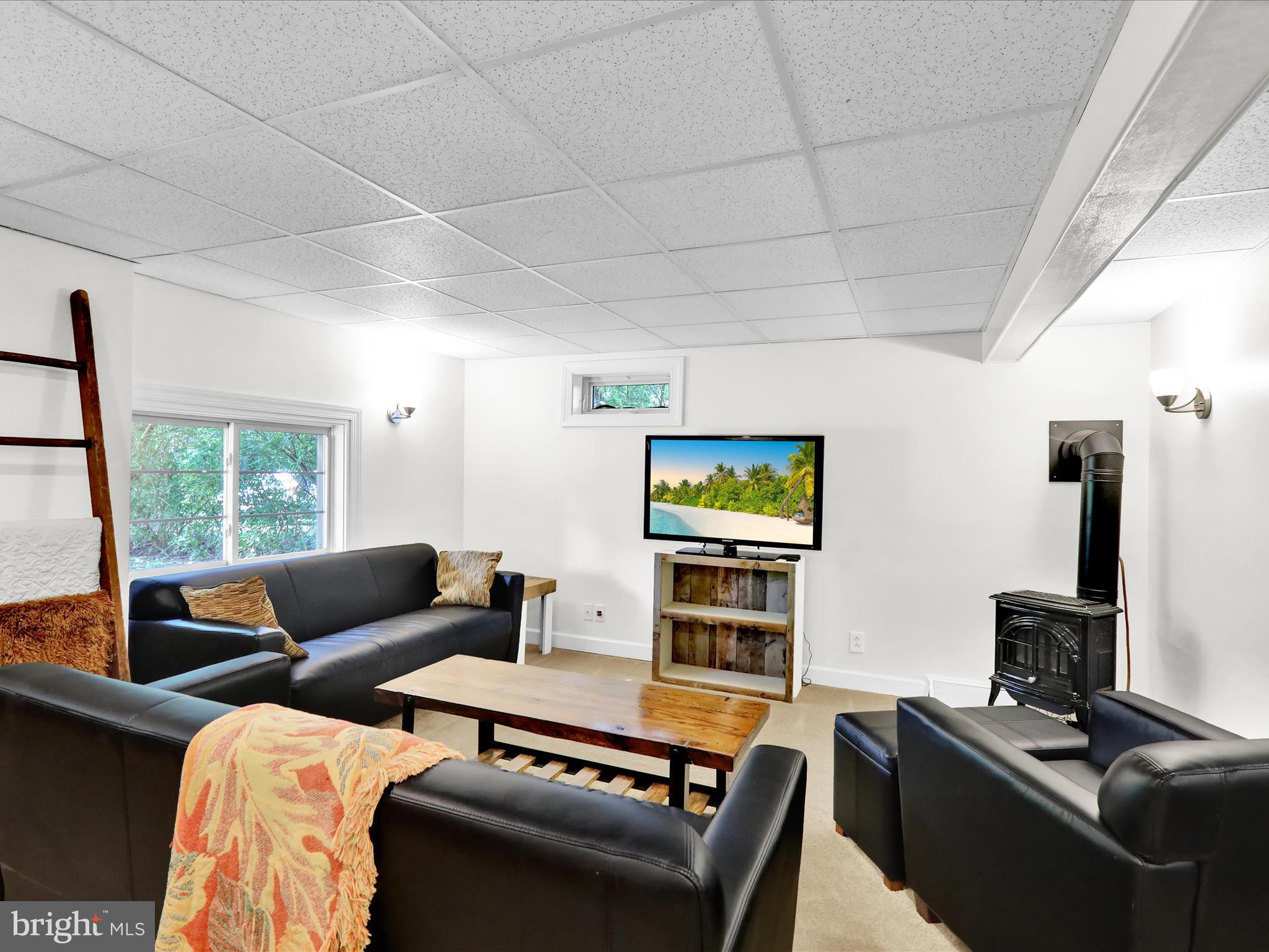 117 West Oregon Road Lititz, PA 17543 - Photo 21 of 34 a living room with furniture and a flat screen tv