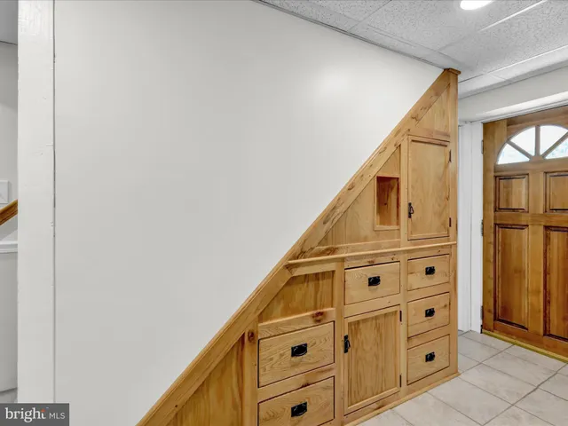 a view of a hallway with windows