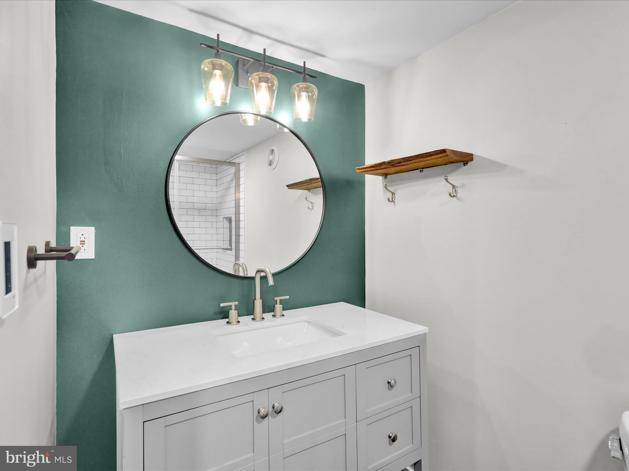117 West Oregon Road Lititz, PA 17543 - Photo 26 of 34 a bathroom with a sink and a mirror
