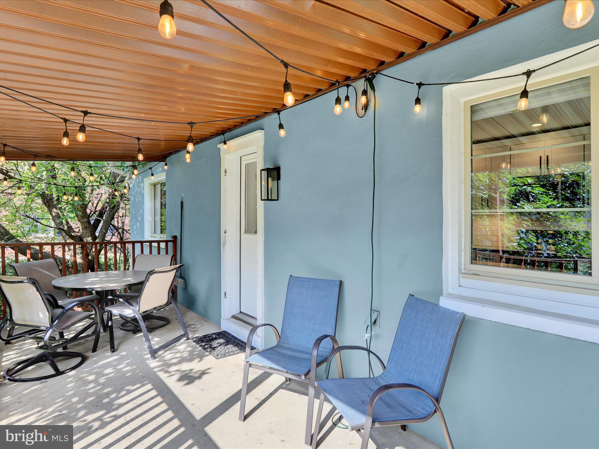 117 West Oregon Road Lititz, PA 17543 - Photo 29 of 34 a patio with table and chairs and potted plants