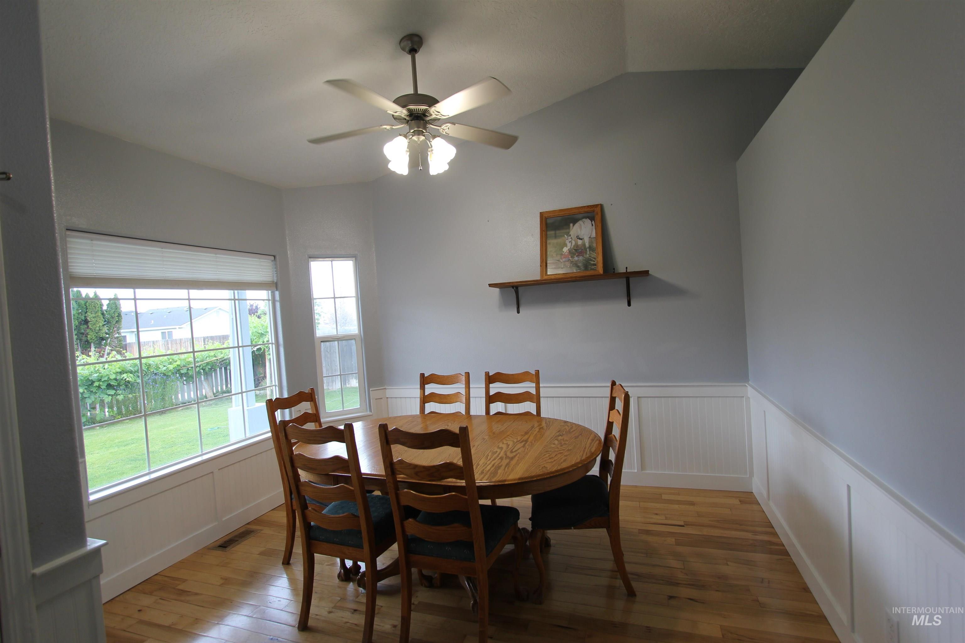 4816 Kadie Street Caldwell, ID 83607 - Photo 6 of 23 Bay window with pleated blinds overlooking the backyard