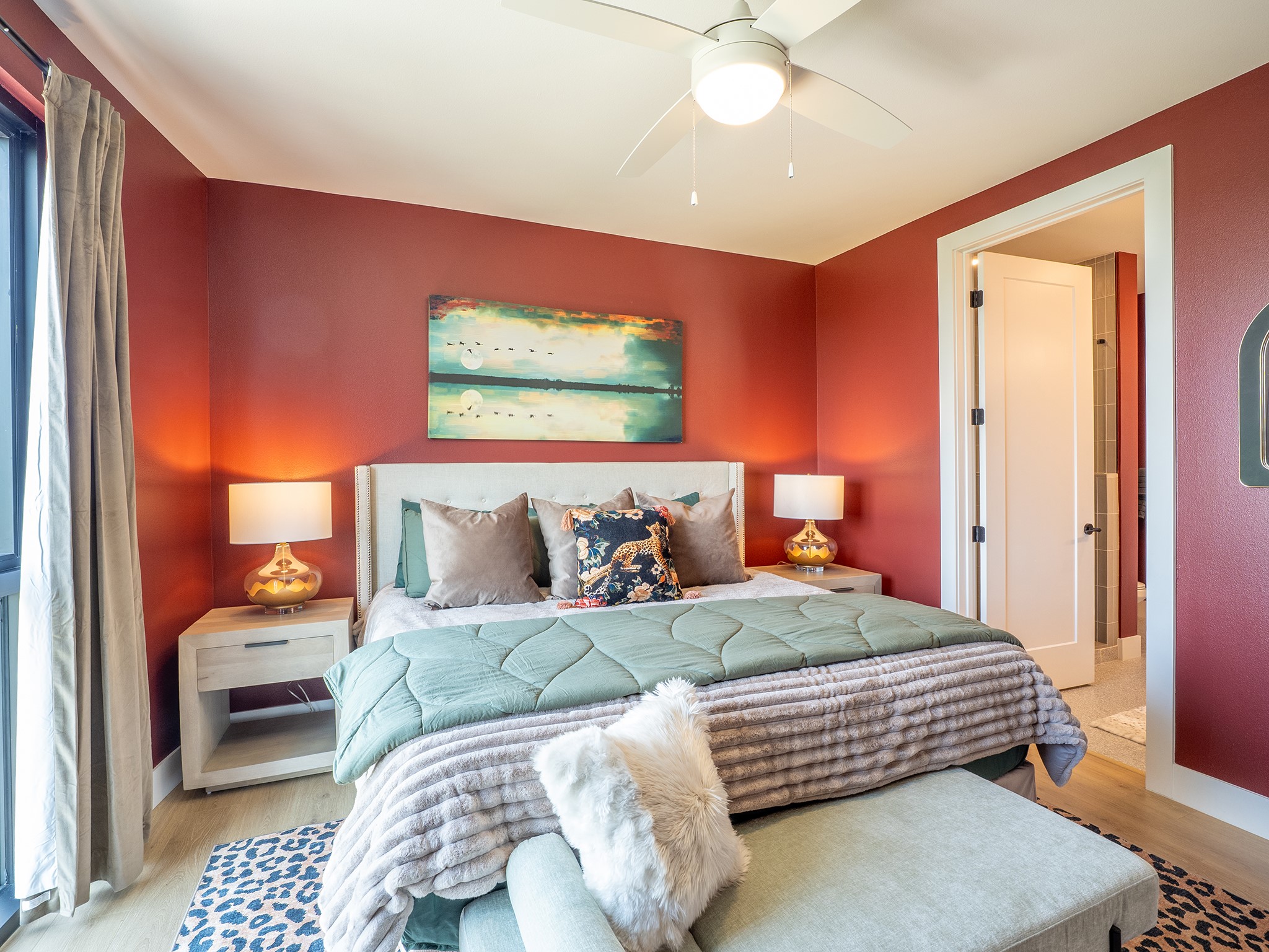 1701 Simond Avenue, Unit 531 Austin, TX 78723 - Photo 13 of 34 a bedroom with a bed and a chandelier