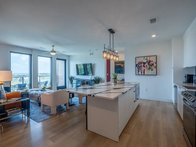 a view of a living room with balcony