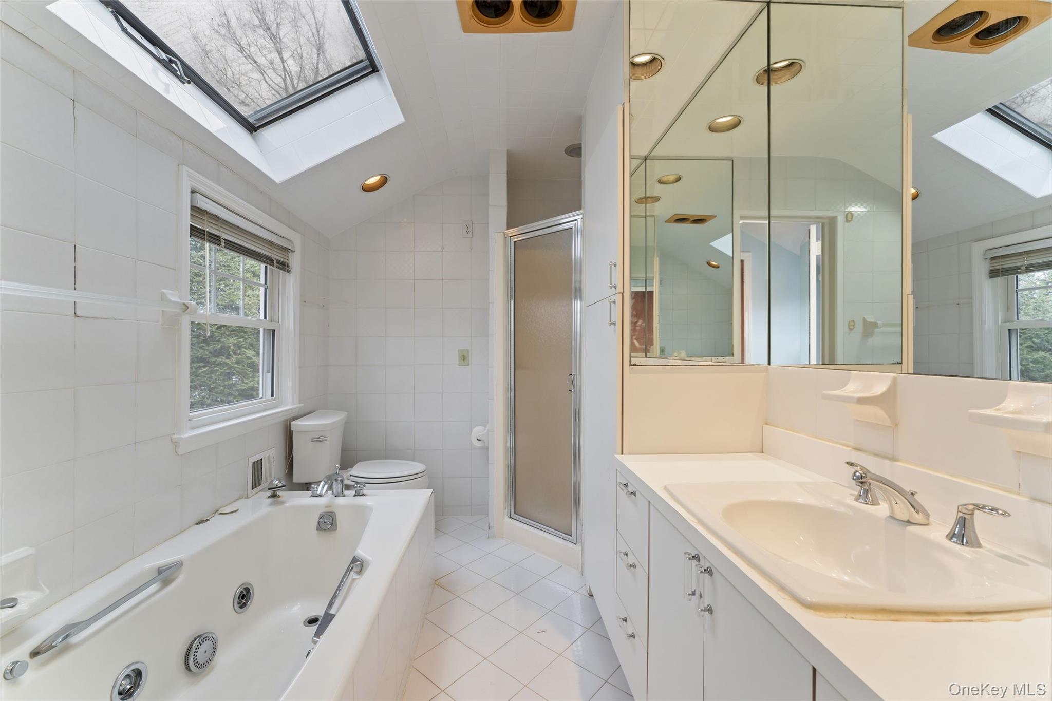 285 Old Colony Road Hartsdale, NY 10530 - Photo 18 of 35 Primary bath with jacuzzi tub and stall shower