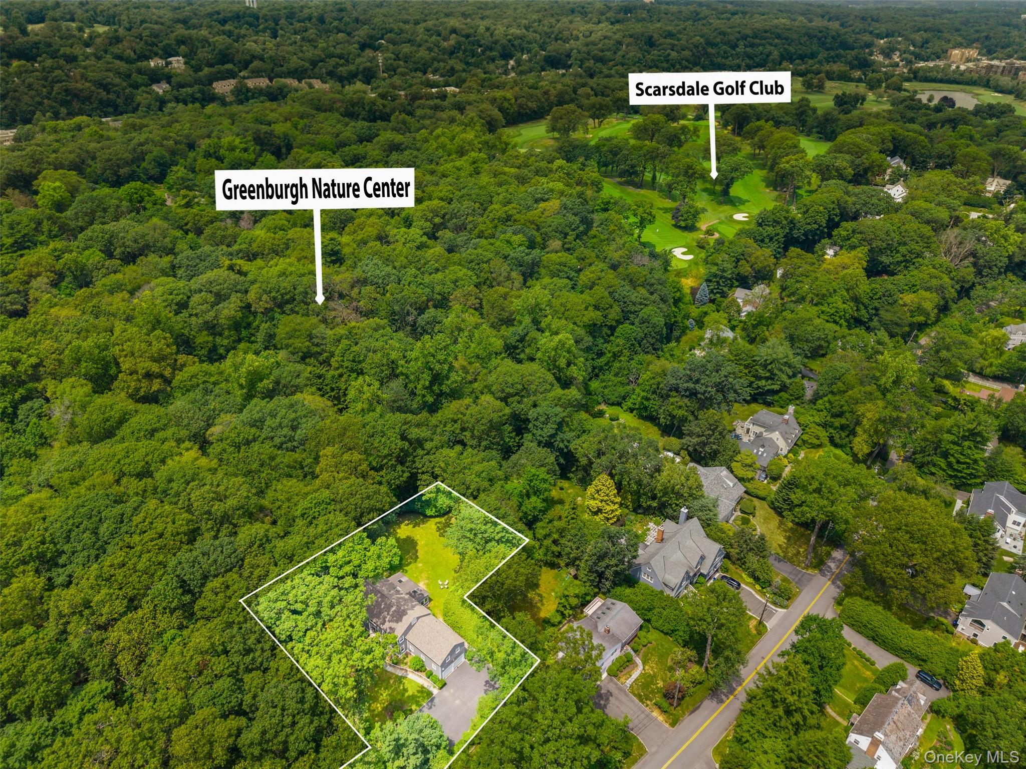 285 Old Colony Road Hartsdale, NY 10530 - Photo 32 of 35 Aerial overview of property's location with property parcel outlined and a forest