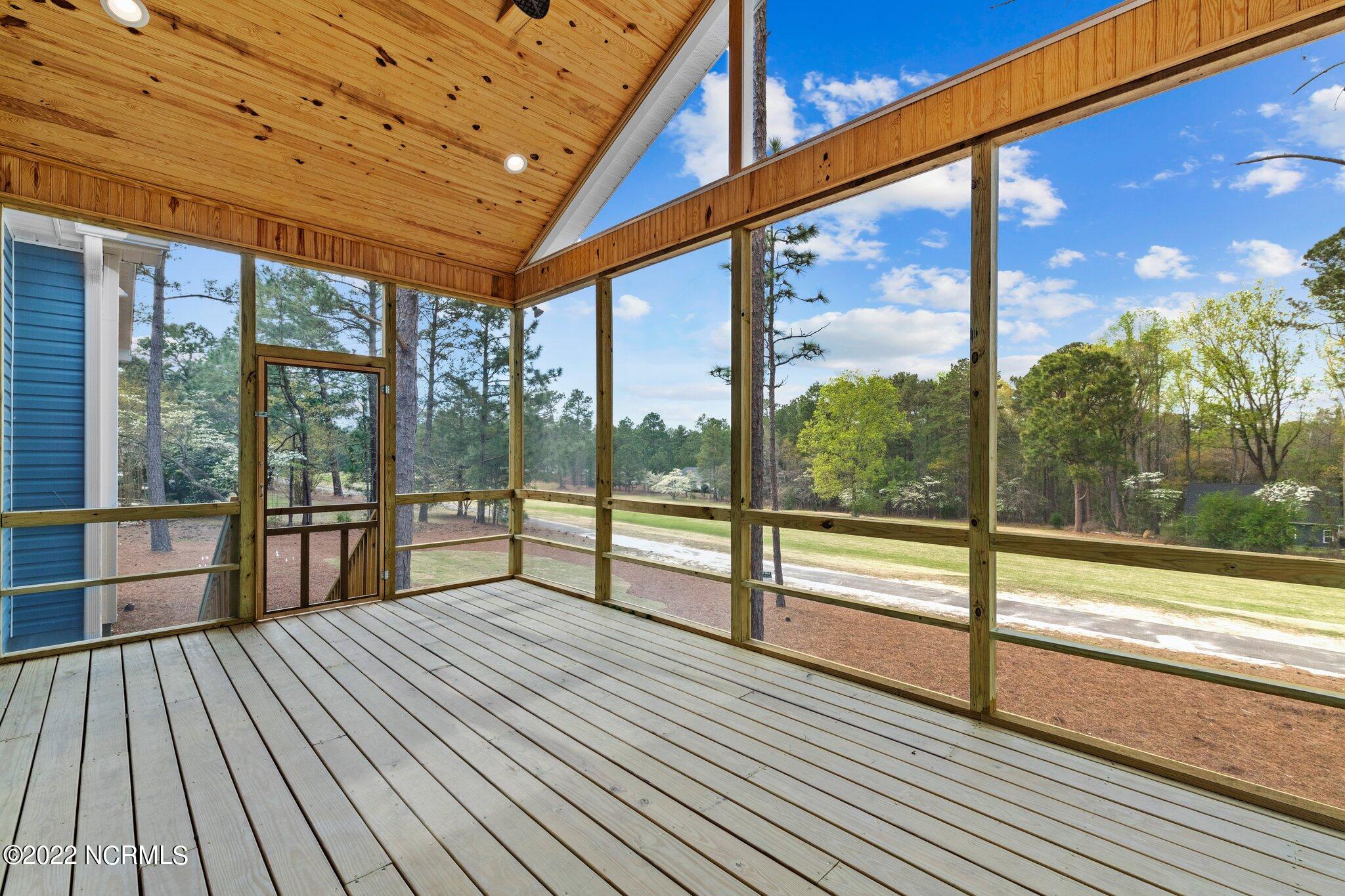 9 Buckhorn Road Jackson Springs, NC 27281 - Photo 8 of 43 9 Buckhorn Rd. Screen porch overlooking