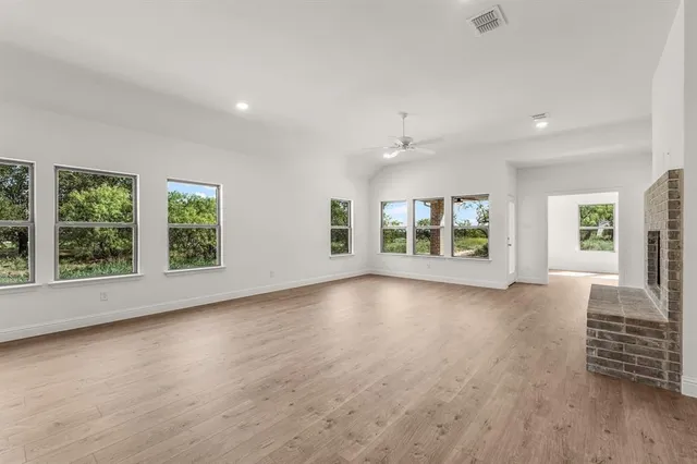 an empty room with windows