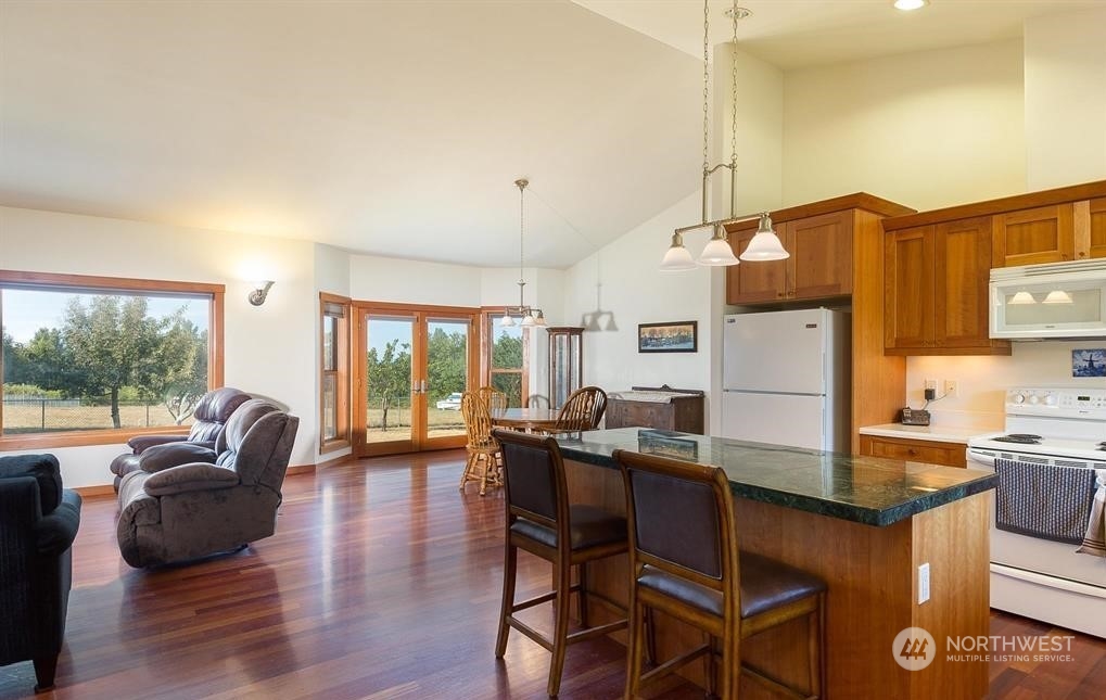 2493 Atterberry Road Sequim, WA 98382 - Photo 16 of 29 a living room with furniture and large windows
