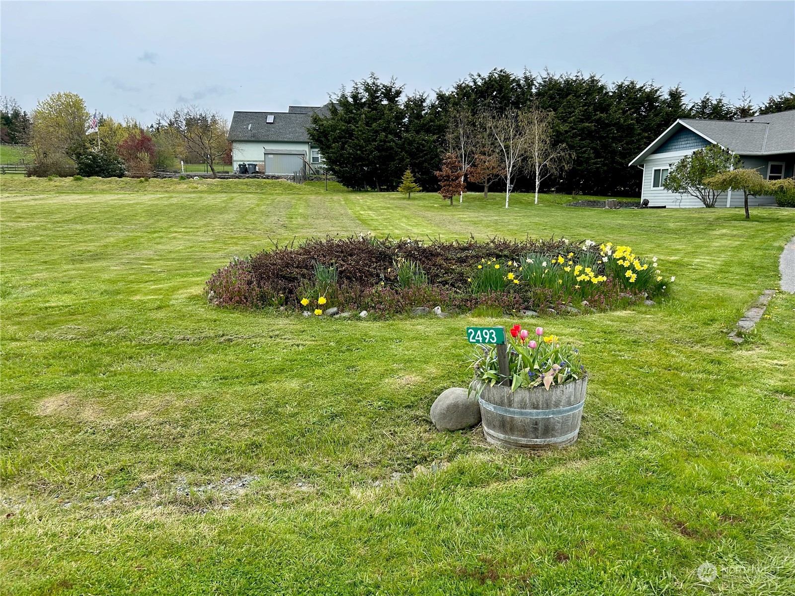 2493 Atterberry Road Sequim, WA 98382 - Photo 3 of 29 a view of a house with a yard